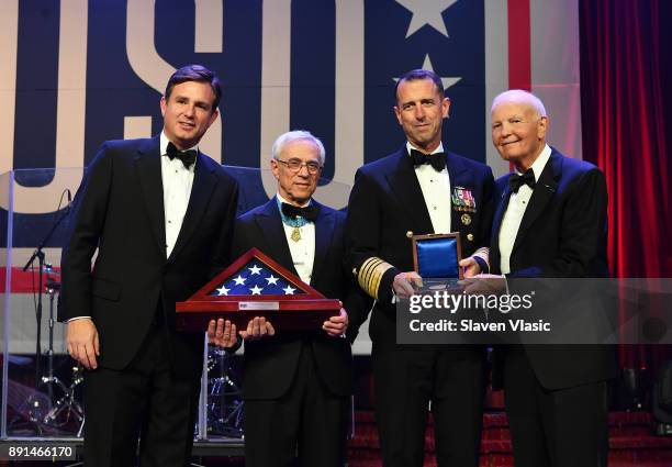 Brian C. Whiting, President and CEO USO of Metropolitan New York, Col. Jack H. Jacobs, Admiral John Richardson and Bruce N. Whitman, Chairman of the...