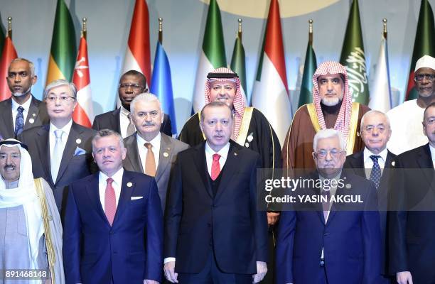 Turkish President Recep Tayyip Erdogan stands next to Emir of Kuwait Sabah Al-Ahmad Al-Jaber Al-Sabah , Jordan's King Abdullah and Palestinian...