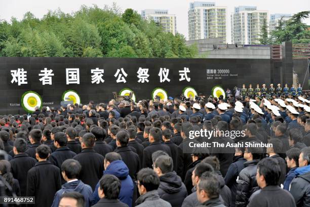 People attend the state ceremony for the Nanjing Massacre at the Nanjing Massacre Museum on December 13, 2017 in Nanjing, China.