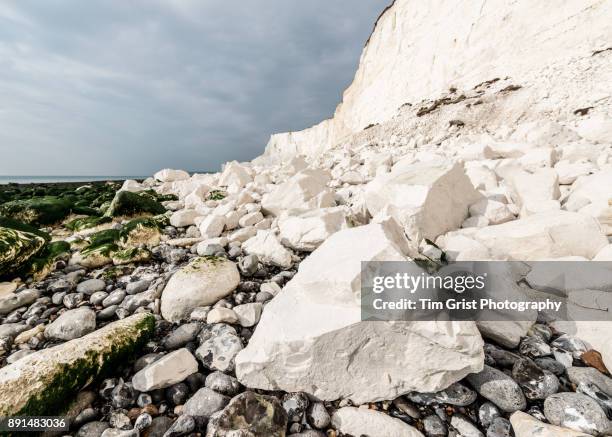 chalk rock fall debris, seven sisters cliffs - chalk strata stock pictures, royalty-free photos & images