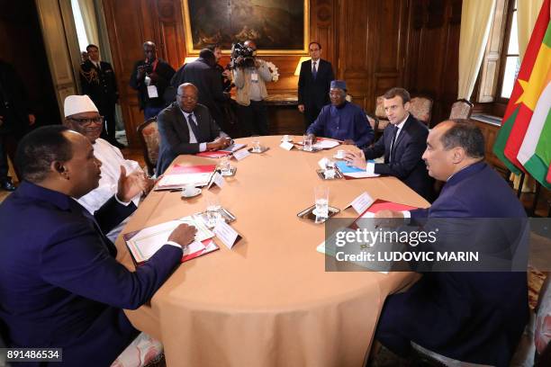 French President Emmanuel Macron hosts a meeting with Niger's President Mahamadou Issoufou, Malian President Ibrahim Boubacar Keita, Burkina Faso's...