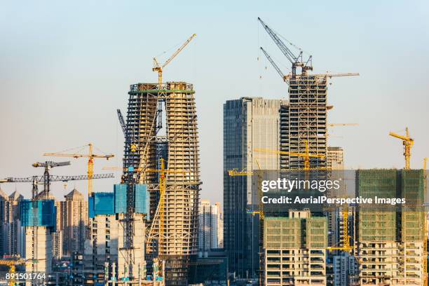 large construction site with cranes, beijing, china - construction crane asia stock pictures, royalty-free photos & images