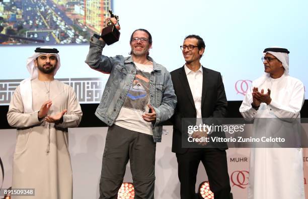 Director Ziad Khalthoum celebrates with the Muhr Best Non Fiction Feature award for "Taste of Cement" with HH Sheikh Mansoor bin Mohammed bin Rashid...