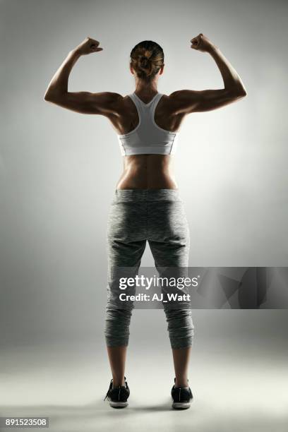 never miss a chance to workout - flexing muscles stock pictures, royalty-free photos & images