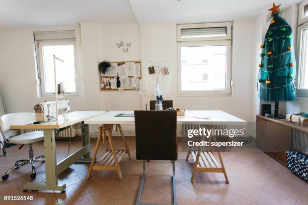 female leaders - clothing design studio stock pictures, royalty-free photos & images