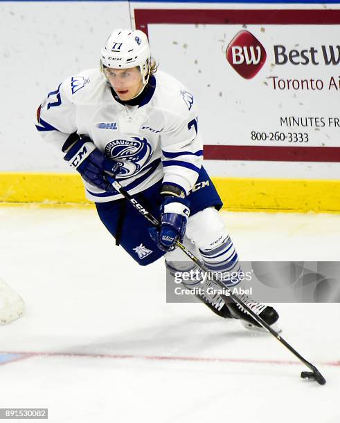 Albert Michnac of the Mississauga Steelheads turns up ice against the Hamilton Bulldogs during game action on December 10, 2017 at Hershey Centre in...