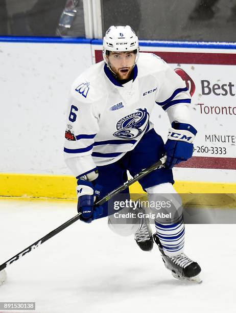 Stephen Gibson of the Mississauga Steelheads turns up ice against the Hamilton Bulldogs during game action on December 10, 2017 at Hershey Centre in...