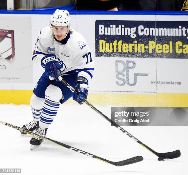Albert Michnac of the Mississauga Steelheads controls the puck against the Hamilton Bulldogs during game action on December 10, 2017 at Hershey...