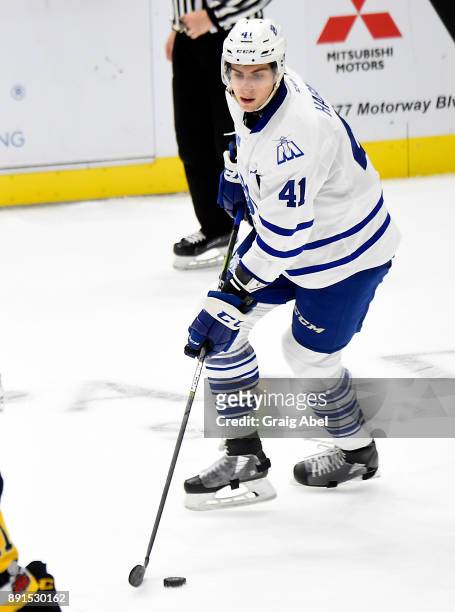Nicolas Hague of the Mississauga Steelheads controls the puck against the Hamilton Bulldogs during game action on December 10, 2017 at Hershey Centre...