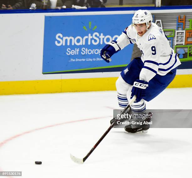 Michael McLeod of the Mississauga Steelheads turns up ice against the Hamilton Bulldogs during game action on December 10, 2017 at Hershey Centre in...