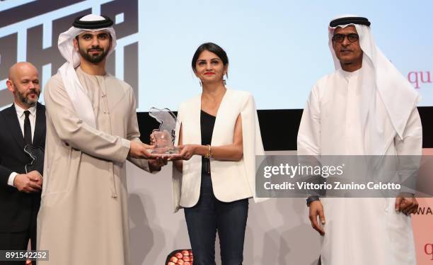 Jury member Ahd Kamel onstage with HH Sheikh Mansoor bin Mohammed bin Rashid Al Maktoum and DIFF Chairman Abdulhamid Juma at the Muhr Awards on day...