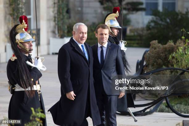 French President Emmanuel Macron welcomes Prime minister of Israel Benjamin Netanyahu prior to a meeting at Elysee Palace on December 10, 2017 in...