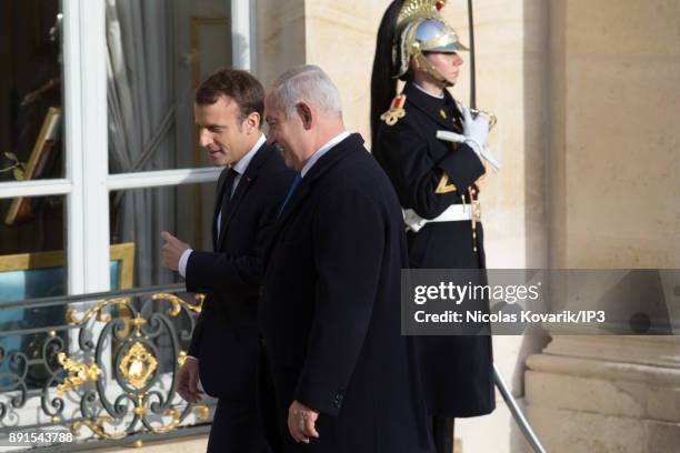 French President Emmanuel Macron welcomes Prime minister of Israel Benjamin Netanyahu prior to a meeting at Elysee Palace on December 10, 2017 in...