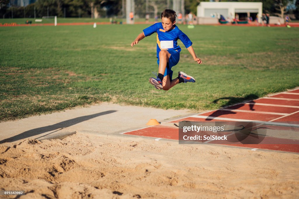 Doing A Long Jump In Athletics Club