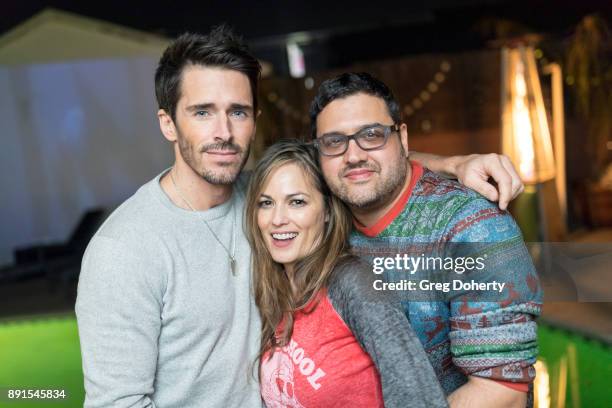 Brandon Beemer, Terri Ivens and Gregori J. Martin attend The Bay - Ugly Sweater And Secret Santa Christmas Party at Private Residence on December 12,...