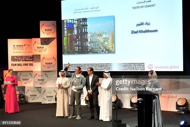 Director Ziad Khalthoum celebrates with the Muhr Best Non Fiction Feature award for "Taste of Cement" with HH Sheikh Mansoor bin Mohammed bin Rashid...