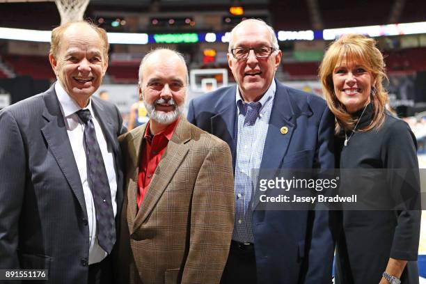 Minnesota Timberwolves owner Glen Taylor poses with others for a photo while the Iowa Wolves take on the Salt Lake City Stars in an NBA G-League game...