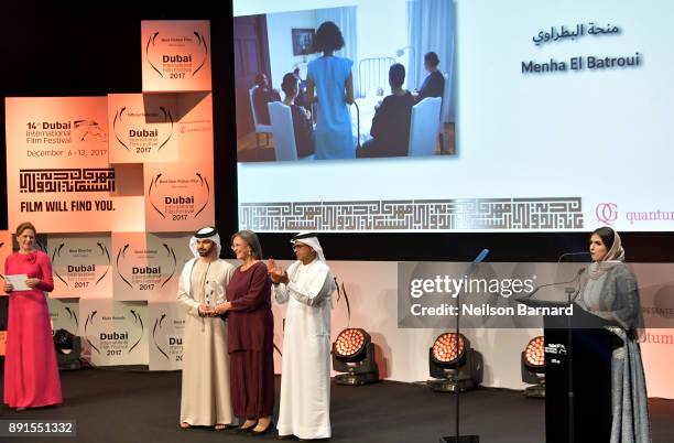 Actress Menha El Batroui with the Muhr Feature Best Actress award for "Cactus Flower" with HH Sheikh Mansoor bin Mohammed bin Rashid Al Maktoum and...