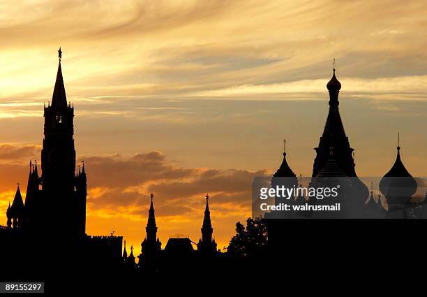 silhouettes of the moscow kremlin - kremlin stock pictures, royalty-free photos & images
