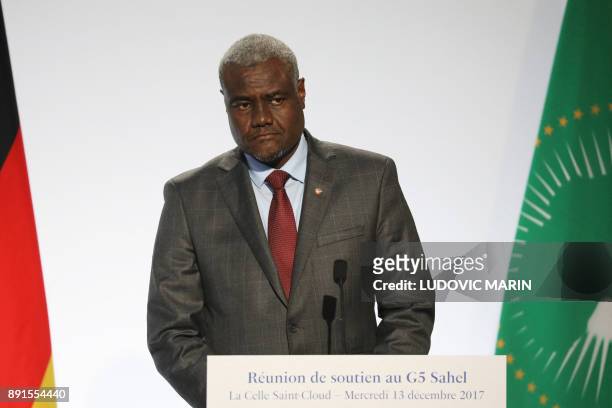 Chairperson of the African Union Commission Moussa Faki Mahamat gives a press conference on December 13, 2017 at La Celle-Saint-Cloud, near Paris,...