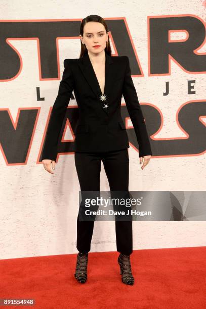 Daisy Ridley attends the 'Star Wars: The Last Jedi' photocall at Corinthia Hotel London on December 13, 2017 in London, England.