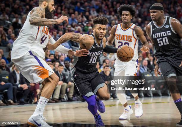 Sacramento Kings guard Frank Mason III drives to the basket against the Phoenix Suns center Tyson Chandler on Tuesday, Dec. 12 at the Golden 1 Center...