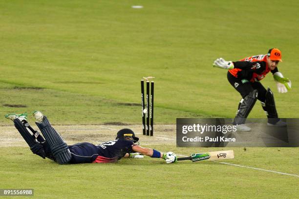 Nick Gubbins of the Lions is run-out by Josh Inglis of the Scorchers during the Twenty20 match between the Perth Scorchers and England Lions at Optus...
