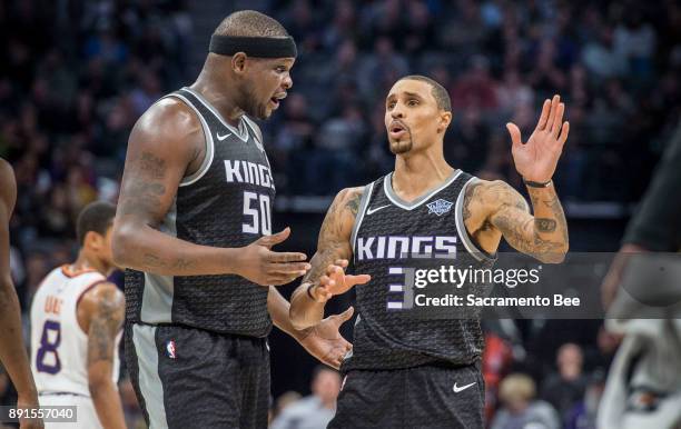 Sacramento Kings forward Zach Randolph and teammate Sacramento Kings guard George Hill talk as their team takes a commanding lede against the Phoenix...