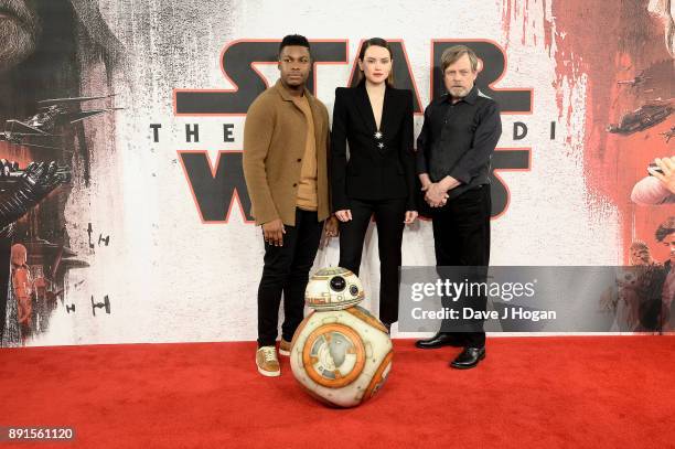 John Boyega, Daisy Ridley and Mark Hamill attend the 'Star Wars: The Last Jedi' photocall at Corinthia Hotel London on December 13, 2017 in London,...