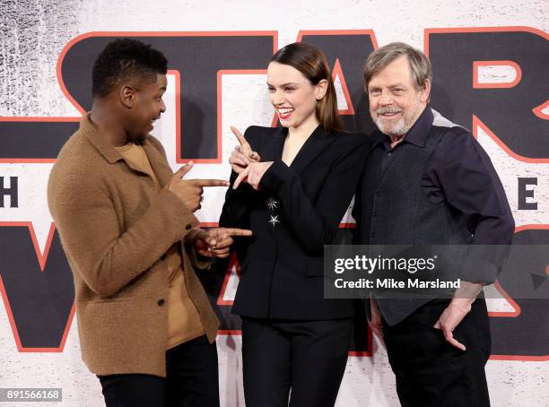 John Boyega, Daisy Ridley and Mark Hamill attend the 'Star Wars: The Last Jedi' photocall at Corinthia Hotel London on December 13, 2017 in London,...