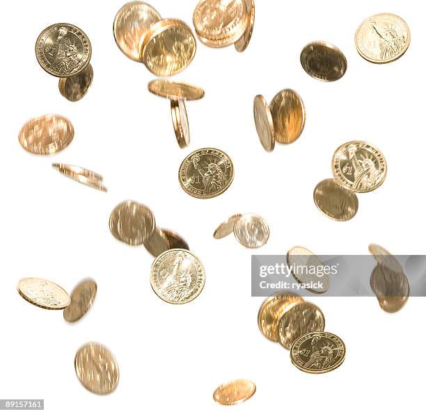falling gold dollar coins money in motion isolated on white - coins falling stock pictures, royalty-free photos & images