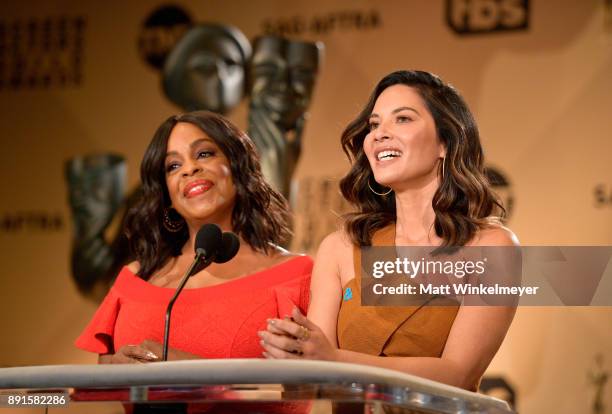 Niecy Nash and Olivia Munn speak onstage during the 24th Annual SAG Awards Nominations Announcement at SilverScreen Theater at the Pacific Design...