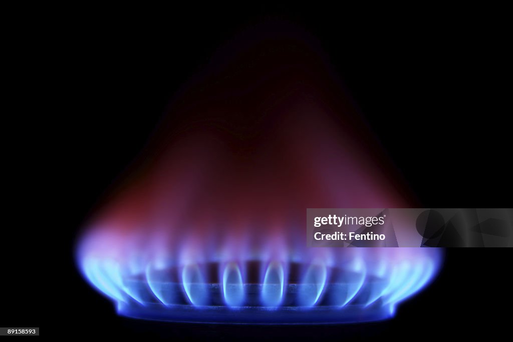 Gas Stove from side  (Blue Flames on Black)