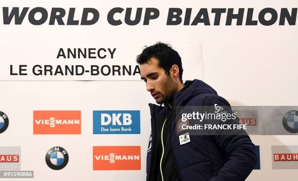 France's Martin Fourcade arrives for a press conference on December 13 two days before the men's 10 km sprint event at the IBU World Cup Biathlon in...