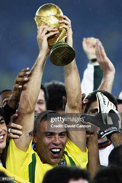Ronaldo of Brazil lifts the trophy after the Germany v Brazil, World Cup Final match played at the International Stadium Yokohama in Yokohama, Japan...