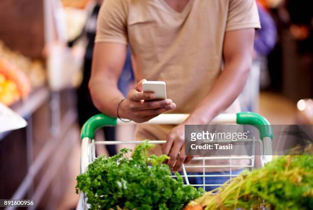 there are many list-managing apps for your next shopping trip - shopping list trolley stock pictures, royalty-free photos & images