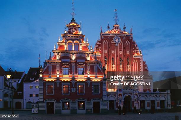Buildings lit up at night, House of Blackheads, Riga, Latvia
