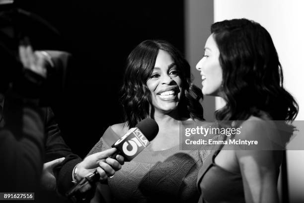 Actors Niecy Nash and Olivia Munn speak at the 24th Annual Screen Actors Guild Awards Nominations Announcement at Silver Screen Theater on December...