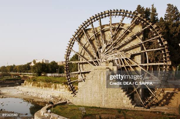 Syria - Hamah. Noria or Na'ura waterwheel on Orontes River