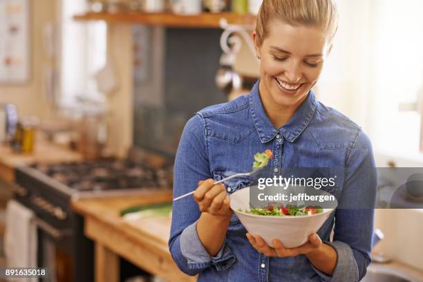 i’m going to enjoy every bite - single adults eating dinner at home stock pictures, royalty-free photos & images