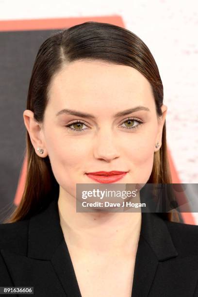 Daisy Ridley attends the 'Star Wars: The Last Jedi' photocall at Corinthia Hotel London on December 13, 2017 in London, England.