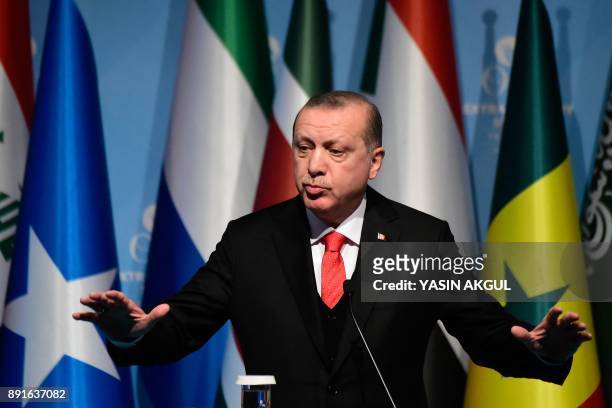 Turkish President Recep Tayyip Erdogan speaks as he holds a press conference following the Extraordinary Summit of the Organisation of Islamic...