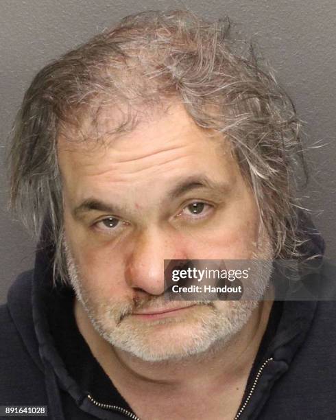 In this handout photo provided by the Essex County Sheriff, Comedian and radio personality Artie Lange poses for his mugshot after being arrested for...