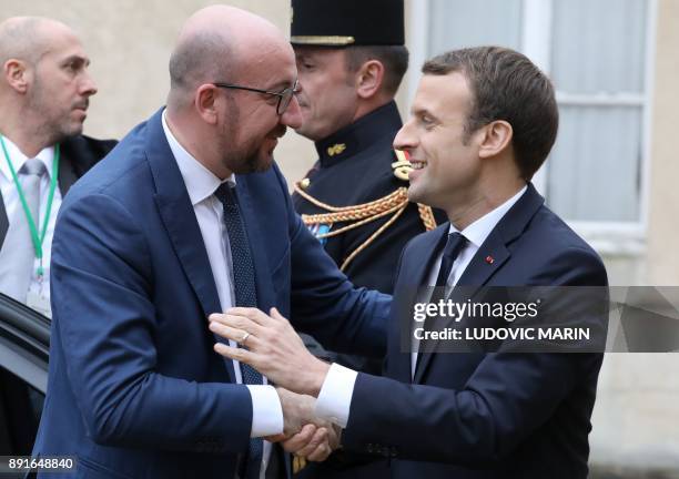 Belgian prime minister Louis Michel is welcomed by French President Emmanuel Macron upon at his arrival for a summit from the underfunded G5 Sahel...