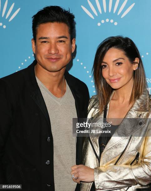 Mario Lopez and Courtney Laine Mazza attend Cirque du Soleil presents the Los Angeles premiere event of 'Luzia' at Dodger Stadium on December 12,...
