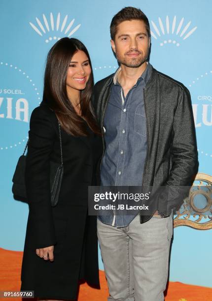 Roselyn Sanchez and Eric Winter attend Cirque du Soleil presents the Los Angeles premiere event of 'Luzia' at Dodger Stadium on December 12, 2017 in...