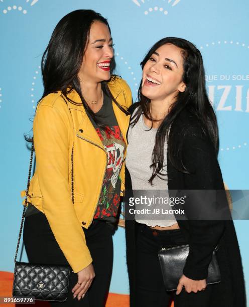 Natalie Martinez and Aimee Garcia attend Cirque du Soleil presents the Los Angeles premiere event of 'Luzia' at Dodger Stadium on December 12, 2017...