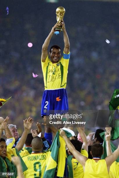 Captain Cafu of Brazil lifts the trophy during the Germany v Brazil, World Cup Final match played at the International Stadium Yokohama in Yokohama,...