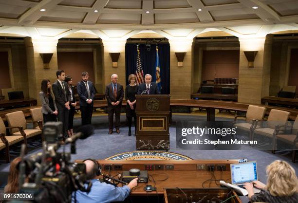 Minnesota Governor Mark Dayton fields questions after introducing Lt. Governor Tina Smith as the replacement to Senator Al Franken on December 13,...