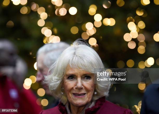 Camilla, Duchess of Cornwall, visits Borough Market on December 13, 2017 in London, England.
